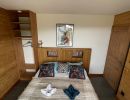 chambre douillette murs en bois chalet